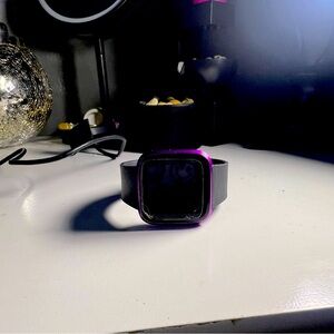 New Fitbit Watch , Used Twice , comes with a charger . Perfect for kids